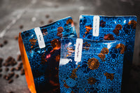 Three bags of Copper Door Coffee Roaster's coffee bean subscription 
