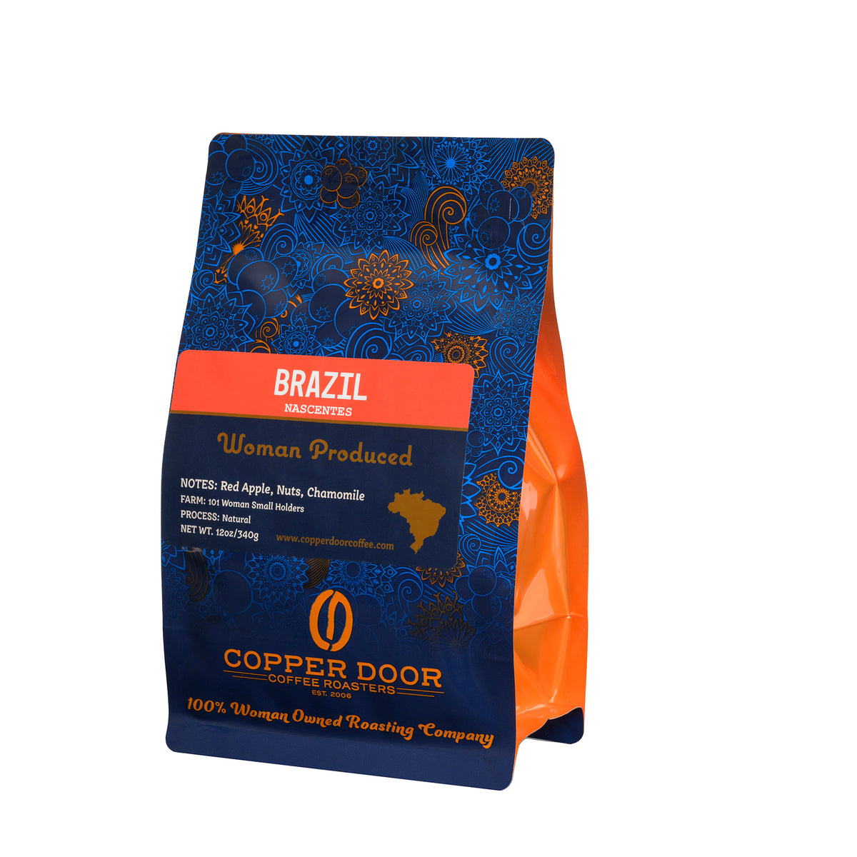 Angled view of Copper Door Coffee Roasters Brazil coffee beans with tasting notes of Red Apple, Nuts, and Chamomile 