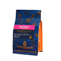 A bag of Guatemala coffee beans from the Huehuetenango region with tasting notes of fig newtons, cocoa nibs, and almonds.