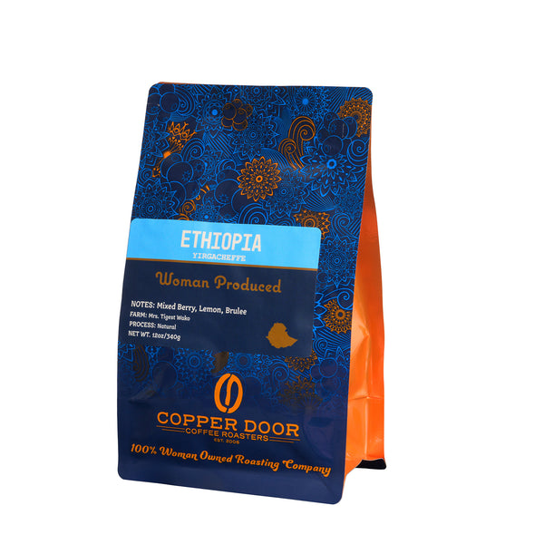Side view of Ethiopia Roast Coffee Beans with notes of Mixed Berry, Lemon, Brulee