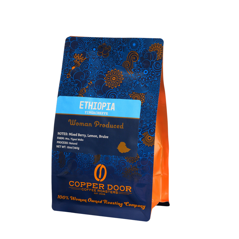 Side view of Ethiopia Yirgacheffe Roast Coffee Beans with notes of Mixed Berry, Lemon, Brulee