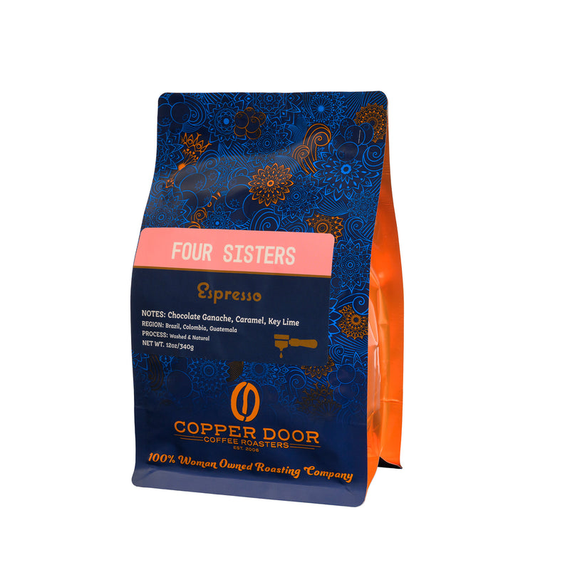 A bag of Copper Door Coffee Roasters Four Sisters espresso coffee beans with notes of chocolate ganache, caramel, and key lime.