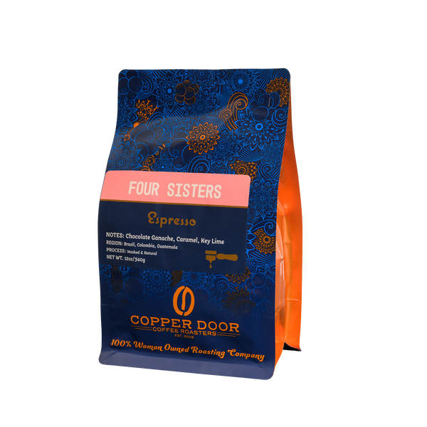 A bag of Four Sisters espresso coffee beans with notes of chocolate ganache, caramel, and key lime from Copper Door Coffee Roasters.