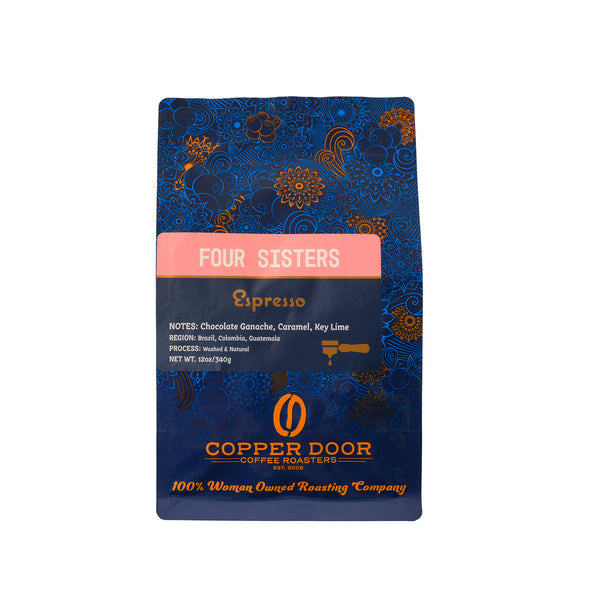 A front view of a bag of Copper Door Coffee Roasters Four Sisters espresso coffee beans with notes of chocolate ganache, caramel, and key lime.
