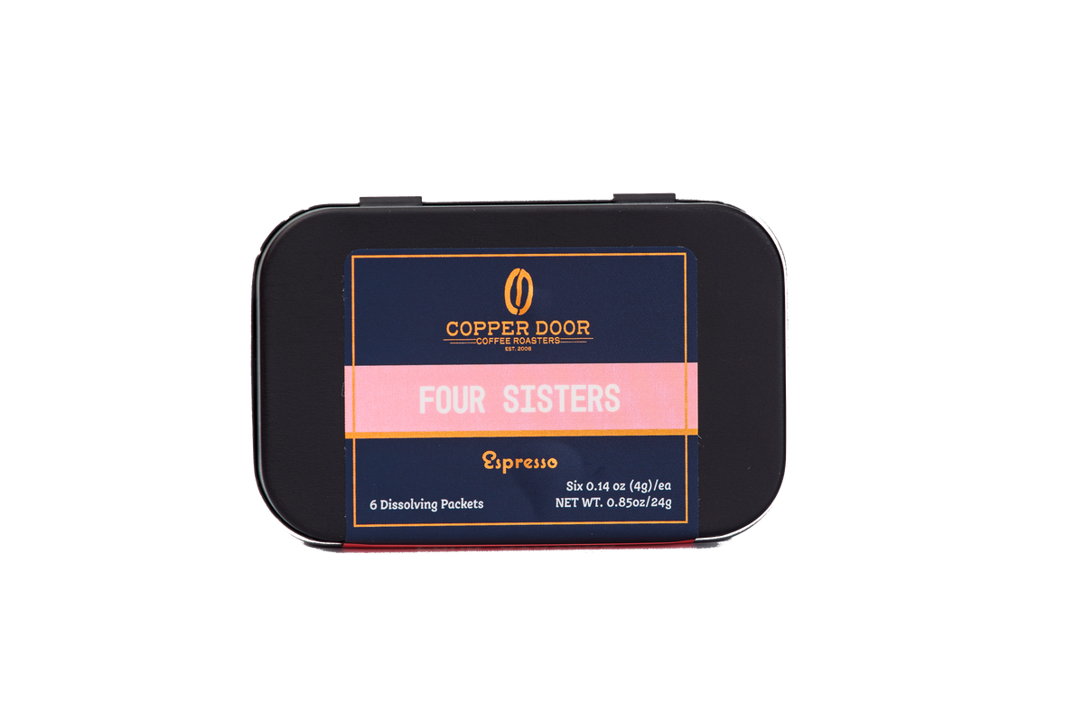 Front view of Copper Door Coffee Roaster's Four Sisters Espresso Instant Coffee Tin