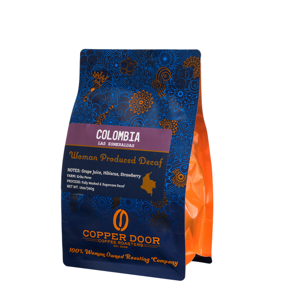 Angled view of Copper Door Coffee Roasters Colombia Decaf Coffee with tasting notes of Grape Juice, Hibiscus & strawberry