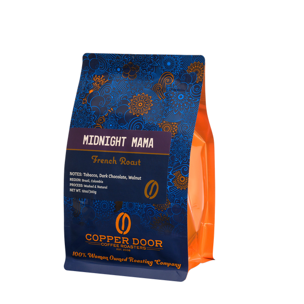 A bag of Midnight Mama coffee beans with tasting notes of tobacco, dark chocolate, and walnut from Copper Door Coffee Roaster's. 