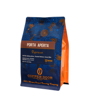 Coffee Bean blend with notes of baking spice, toasted walnut and cacao nibs from Copper Door Coffee Roasts. 
