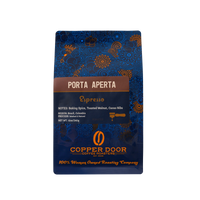 Coffee Bean blend with notes of baking spice, toasted walnut and cacao nibs from Copper Door Coffee Roasts. 
