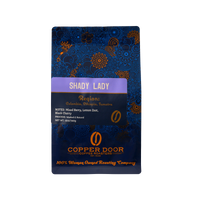 Front view of Shady Lady Coffee Blend with tasting notes of Mixed Berry, Lemon Zest, and Black Cherry.